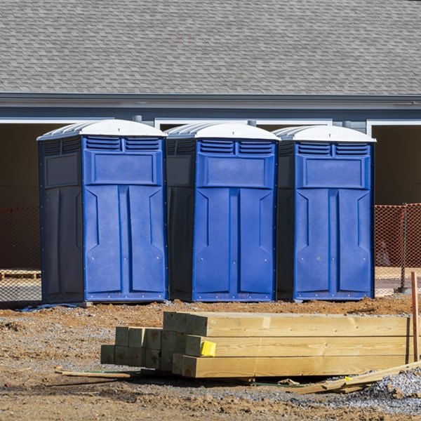 what is the cost difference between standard and deluxe porta potty rentals in Marne